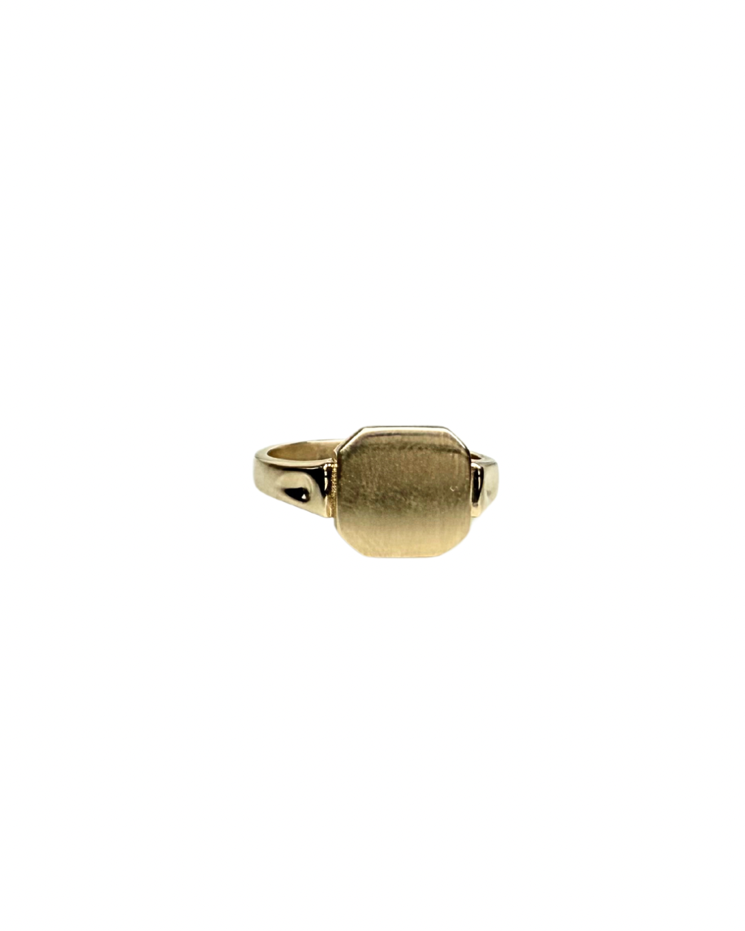 Maggie’s pinky signet ring