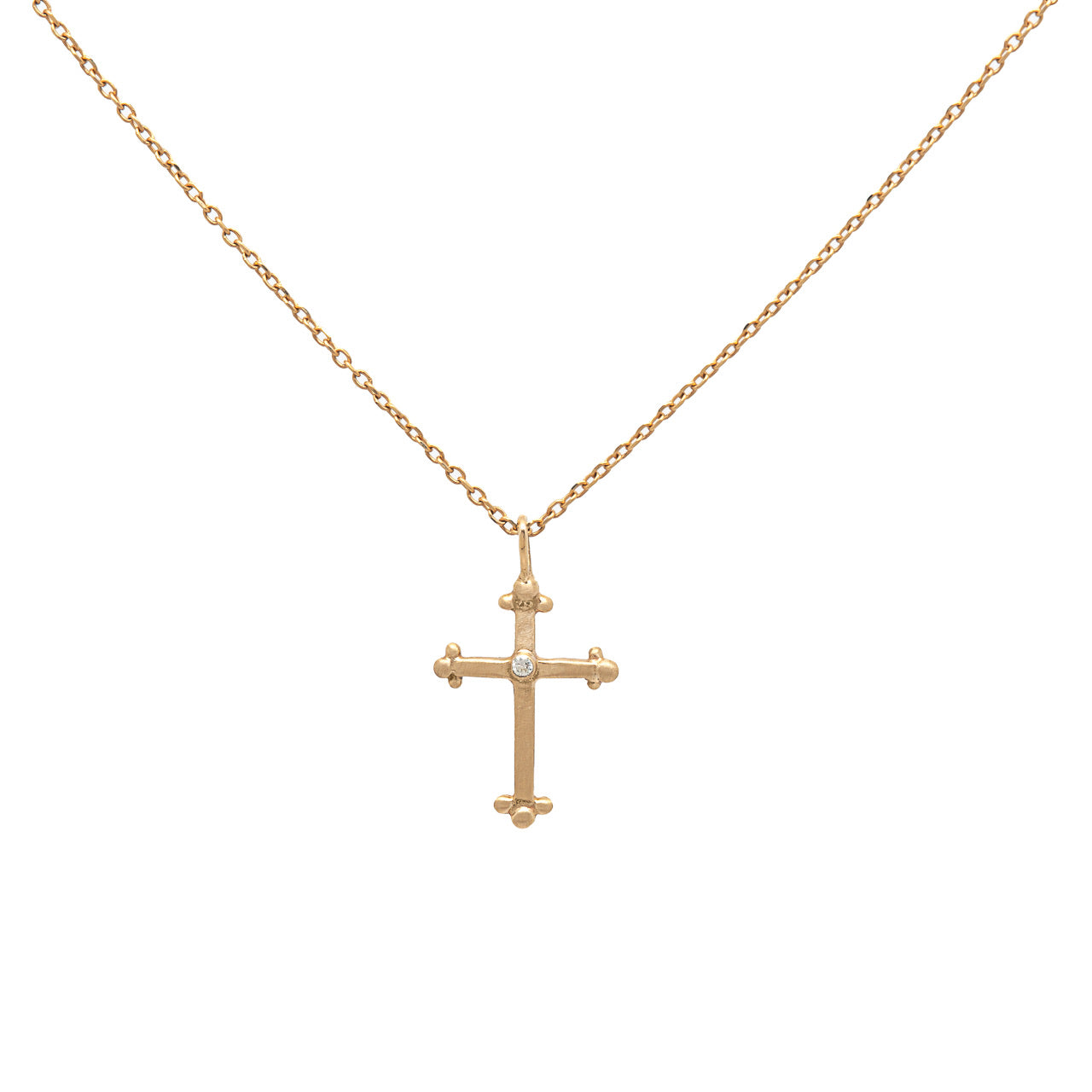 Petite gold and diamond cross